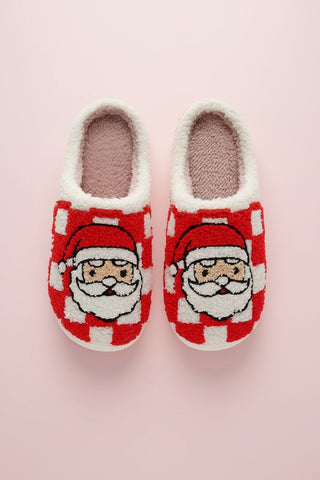 Pair of Santa-themed slippers with red and white checkered pattern on a white background.